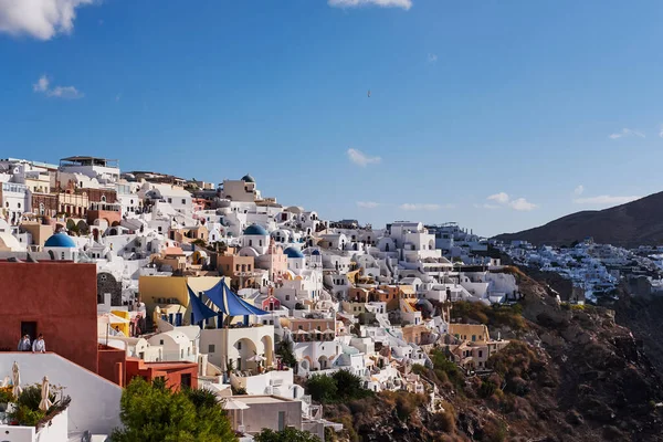 stock image Panoramic Aerial View of the Poscard Perfect Oia Village in Santorini Island, Greece - Traditional White Houses in the Caldera Cliffs - Sunset