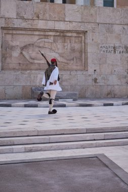 Presidential Guard with Traditional Evzone's Uniform - ceremonial infantry unit that guards the Tomb of the Unknown Soldier and the Presidential Mansion in Athens, Greece