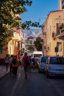 Street with View to Arch of Hadrian - Monumental gateway resembling a Roman triumphal arch - Athens, Greece