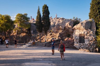 Tourists at Areopagus Hill at Sunset - Greece