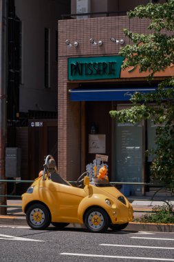 Funny Little Yellow Car Looking Like Pikachu - Tokyo, Japan clipart