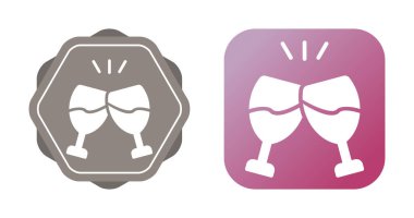 İki şarap kadehi dekoratif simgelerin içinde birbirine vuruyor.