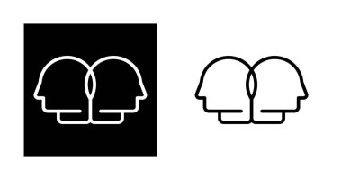 Birbirine bağlı iki insan kafası siluetini gösteren stilize bir grafik, ortaklığı ve sinerjiyi temsil ediyor..