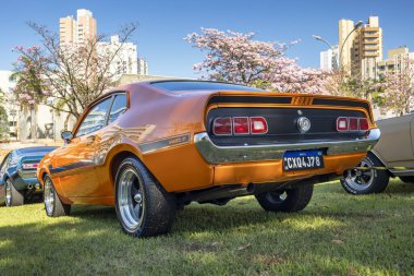 1976 Ford Maverick GT V8 302 on exhibition at the Third Municipal Antique Car Day in the city of Londrina, southern Brazil. clipart