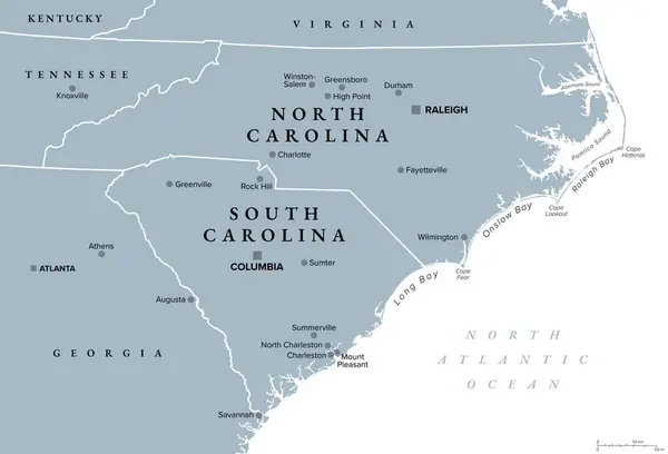 stock vector The Carolinas or simply Carolina, U.S. states North and South Carolina, gray political map, with borders and capitals Raleigh and Columbia. Bordered by Virginia, Tennessee, Georgia, and the Atlantic.