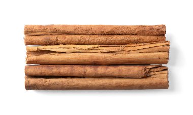 Seylan tarçın kabuğu sopaları, yukarıdan. Gerçek tarçın ağacının üç şeritli kuru kabuğu, Cinnamomum verum, birbirine paralel dizilmiş. Aromatik baharat ve lezzet katkı maddesi olarak kullanılır..