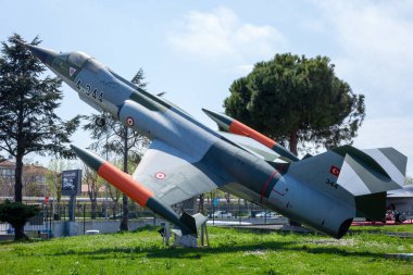 İstanbul, Yeşilköy - Türkiye - 04.20.2023: Lockheed F-104 Yıldız Savaşçısı Süpersonic Fighter and Bomber Jet, Clear Blue Sky