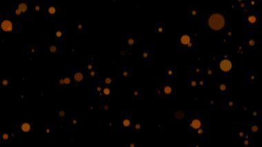 Altın Bokeh Işıkları Soyut Arkaplan. 4K siyah arkaplanda bulanık parlatıcı bokehler ve toz parçacıkları.