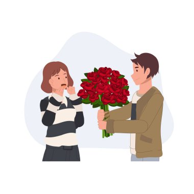 Valentine's day concept. A young man holds a beautiful bouquet of red roses and give it to a woman. showing his love.