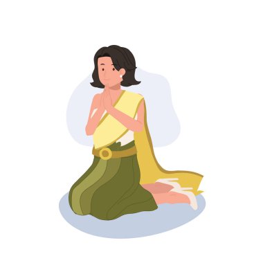 Tayland Kültürü konsepti. Geleneksel elbiseli Taylandlı kadın oturup dua ediyor, vai yapıyor. Dua eden Hareketler