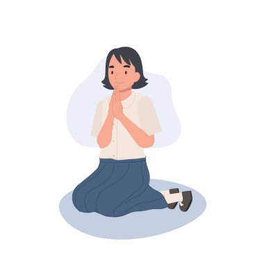 Tayland Kültürü konsepti. Taylandlı öğrenci oturmuş dua ediyor, vai yapıyor. Dua eden Hareketler