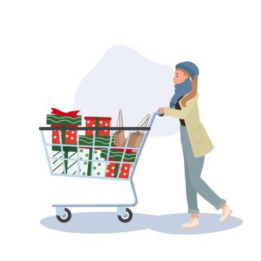 Bayram alışverişi var. Kış modasında neşeli bir kadın Noel alışverişinin tadını çıkarıyor alışveriş arabasıyla.