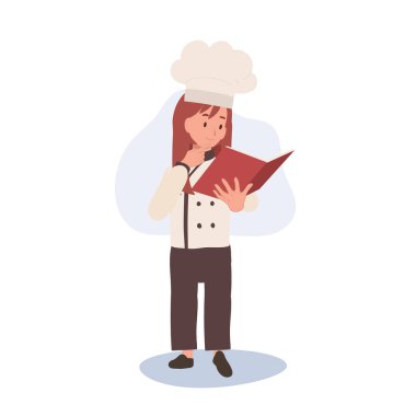 Genç aşçı aşçılık kitabı okuyor. Çocuk Aşçı Yemek Yapmayı Öğreniyor