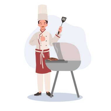 Izgara ustası aşçı dışarıda yemek pişiriyor. Gurme Mangal Mutfağı