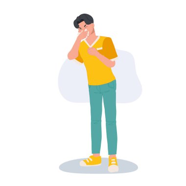 Alerji ve Soğuk Savaş Konsepti. Kağıt mendille hapşıran adam.