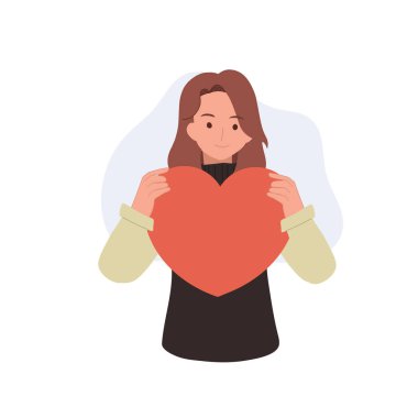 Kadın, kendini sevme, ilgi ve duygusal desteğin sembolü olarak büyük kırmızı kalbi tutuyor.