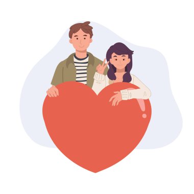 Kırmızı kalpli romantik çift sevgililer gününde sevgi ve sevgiyi kutlamak için sarılıyor.