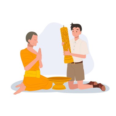 Genç bir Taylandlı öğrenci tapınaktaki Khao Phansa sırasında bir keşişe mum veriyor.