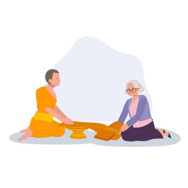 Budist geleneği olan yaşlı kadın Budist bir günde keşişe cübbe sunuyor.