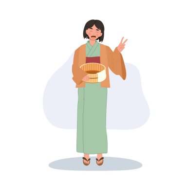 Geleneksel Yukata 'da gülümseyen Japon kız. Havlu ve tahta kovayla. 