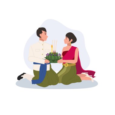 Thai Kültür Festivali sahnesi. Geleneksel giysiler içinde diz çökmüş bir çift, Tayland 'da Loy Krathong kutlaması için Krathong tutuyorlar.