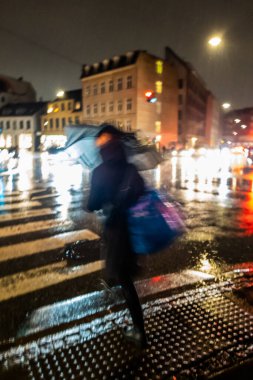 Copenhagen, Denmark Pedestrians in the rain on Vesterbrogade in downtown.
