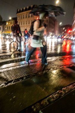 Copenhagen, Denmark Pedestrians in the rain on Vesterbrogade in downtown.