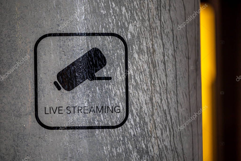 Copenhagen, Denmark A sign on a wll announced live streaming as a security measure.