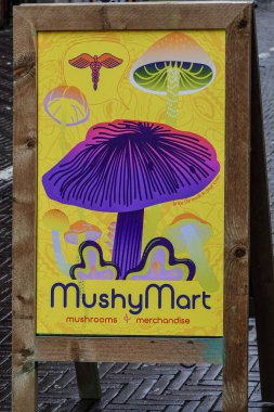 The Hague, Netherlands A sign on the street for psychedelic mushrooms. clipart