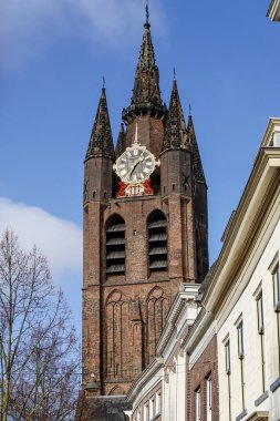 Delf, Netherlands A view of the leaning Oude Kerk, old church, in the old town.