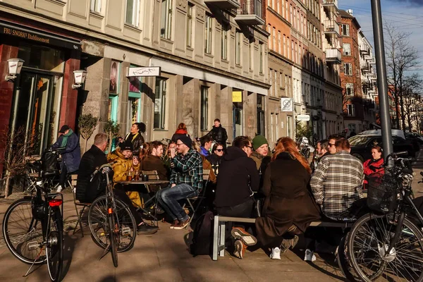 stock image Copenhagen, Denmark People drinking at an outdoor terrace on Istegade i downtown