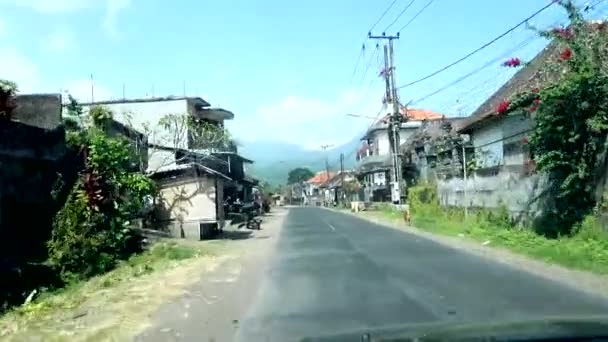 인도네시아의 발리에서 자동차 교외를 지나고 — 비디오