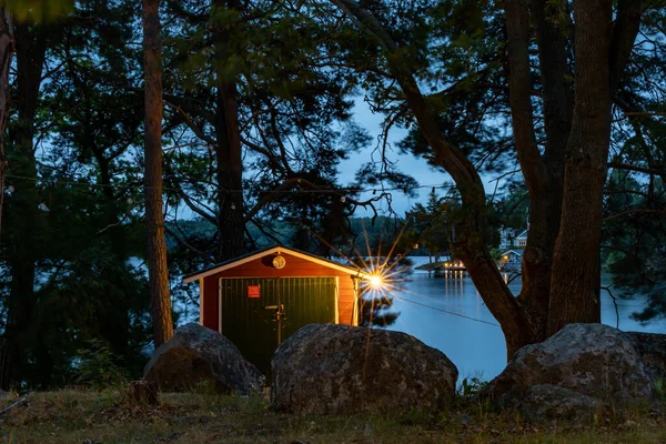 Stockholm Sweden Lightbulb Hanging Red Outhouse Illuminate Path Island — Stock Photo, Image