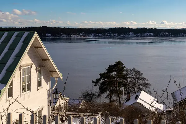 Dalaro, Sweden Houses on the coast of the Baltic Sea in winter.