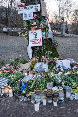 Stockholm, Sweden March 6, 2024 Memorials, wreaths, flowers and candles for Alexei Anatolyevich Navalny,  a Russian opposition leader, lawyer, anti-corruption activist. clipart
