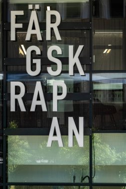 Stockholm, Sweden June 20, 2024 A sign in Swedish for the   Fargskrapan landmark building in the Sollentuna Centrum. clipart