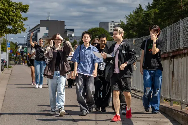 stock image Stockholm, Sweden Aug 2, 2024 A group of young people gather in the Telefonplan district led by a community organizer to practice an outdoor Kpop-inspired dance show.