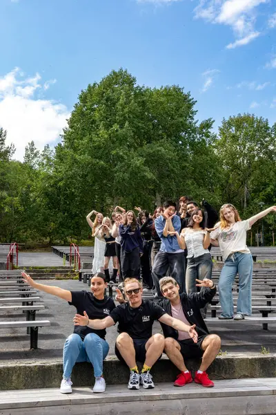 stock image Stockholm, Sweden Aug 2, 2024 A group of young people gather in the Telefonplan district led by a community organizer to practice an outdoor Kpop-inspired dance show.