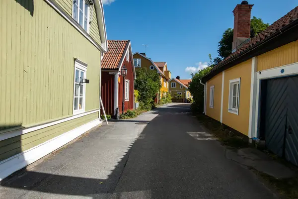 stock image Osthammar, Sweden Aug 19, 2024 Cute and small wooden houses in the downtown.