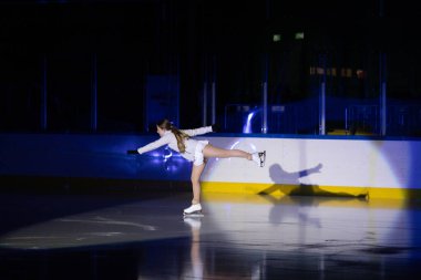 Stockholm, Sweden Aug 23, 2024 A figure skater practices skating moves on the ice. clipart