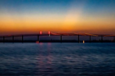 Solomons, Maryland USA The Solomons Bridge at sunset. clipart