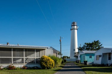 Fenwick Island, Delaware, USA Sept 3, 2024 Private residential vacation  homes near Ocean Beach Maryland with the Fenwick Island Lighthouse. clipart