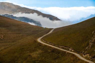 Khinalug, Azerbaijan A panoramic view of a road above the  Qudyalchay River basin. clipart