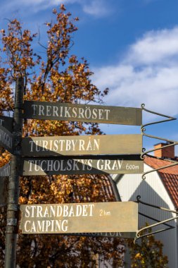 Mariefred, Sweden Oct 23, 2024  Directional signs on the main square in the Old Town. clipart