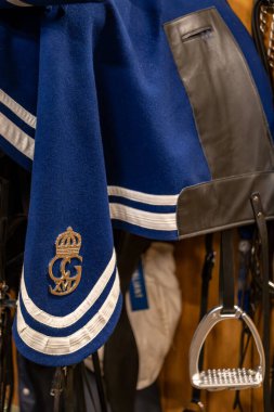 Stockholm, Sweden Oct 27, 2024 A detail of stirrups and saddle at the Swedish Livgardets Kavallerikasern, or Mounted Police stables. clipart