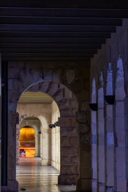 Valletta, Malta  A colonnade at night in the Sliema district. clipart