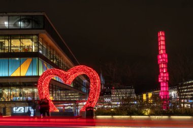 Stockholm, Sweden Nov 29, 2024 A large red illuminated heart and a view over Sergels Torg in the downtown. clipart