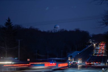 Solomons, Maryland, USA Traffic streaks at night on Rte 4 clipart