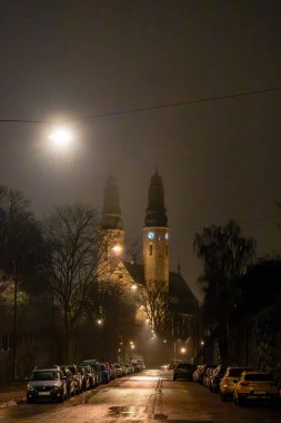 Stockholm, Sweden Jan 20, 2025 A view of the Hogalids Church on Sodermalm at night. clipart