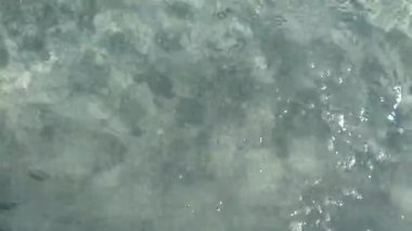 Porto Pino, Sardunya, İtalya Sahilde kristal berrak sığ su.